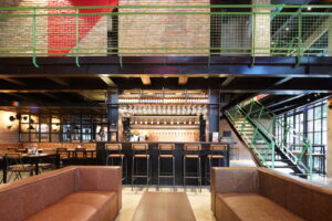 BELGO interior exposed brick industrial restaurant ARCCAN fast-track permit design